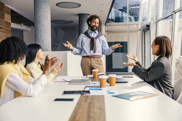 istock Business team applauding successful presentation in conference room 2252513578