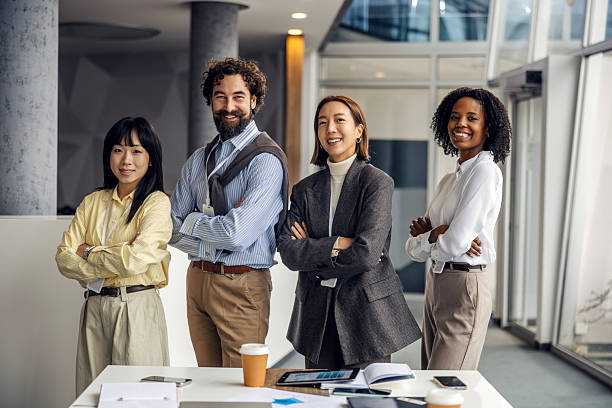 istock Diverse business team smiling confidently in modern office 2252513635
