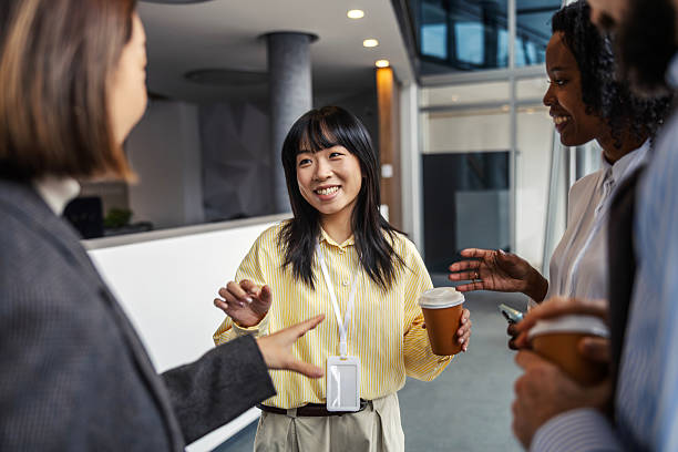 istock Diverse business professionals having a casual office conversation 2252513705
