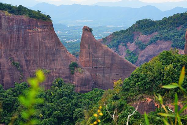 Rock formations in Danxia Mountains (Danxiashan) in Renhua County in Shaoguan (Guangdong Province) in China. Seal shaped rock. AAAAA rated tourist attraction.