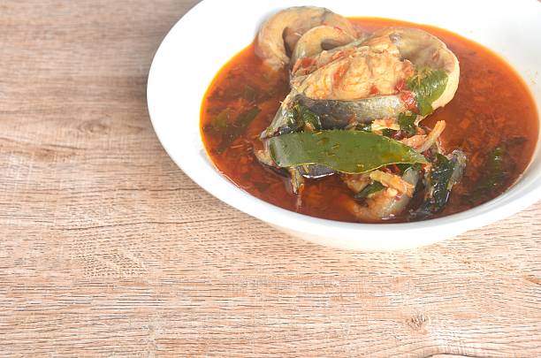 istock spicy chili boiled catfish with eggplant and basil in curry soup 2252519184