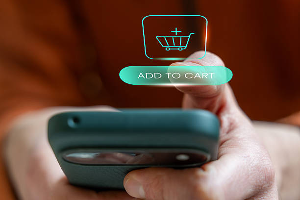 istock Moibile App Purchasing Decision Concept, Green Add-to-Cart Button, Online E-Commerce Shopping Without Leaving Home, Global Consumerism 2252523577