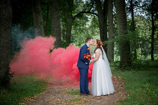 istock Romantic Kiss Between Newlyweds In Forest 2252524500