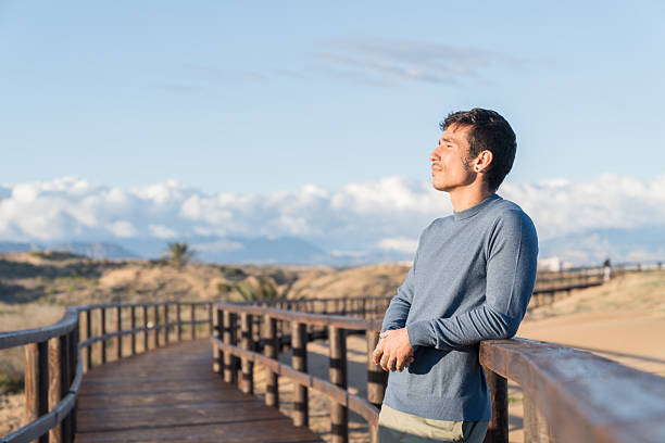 Pensive mature man portrait outdoors