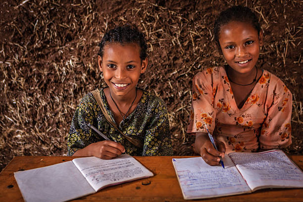 istock African little girl is learning Amharic language 2252527215