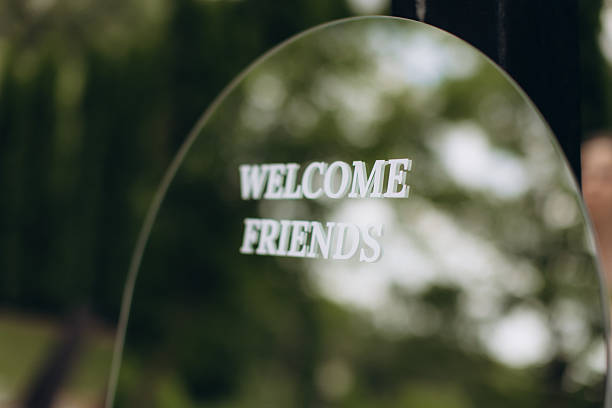 istock Welcome friends text on a round mirror sign 2252528633