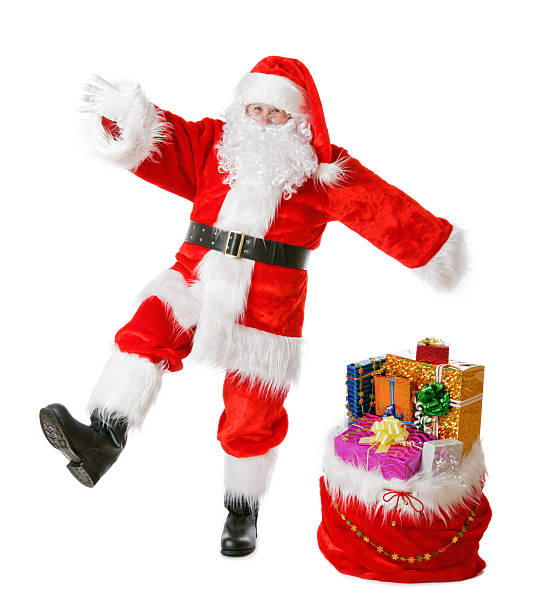 Traditional Christmas Santa dancing with gifts, isolated on white. You can divide this photo into 2 images - Santa and sack with gifts, and use each separately.