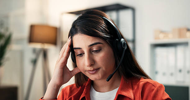 istock Tired, woman or burnout in office with customer service stress, human resources issue or contemplating. Thinking, consultant and overworked person in workplace with fatigue, telecom fail and problem. 2252534410