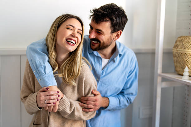 istock Happy couple smiling and enjoying a loving relationship at home, expressing joy and shared happiness 2252535745