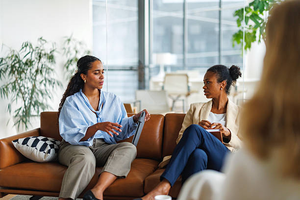istock Hispanic and Multiracial Women Engaging in Office Discussion 2252538444