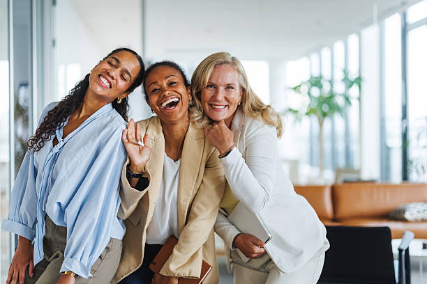 istock Joyful Businesswomen Posing Together in Bright Office Environment 2252538448