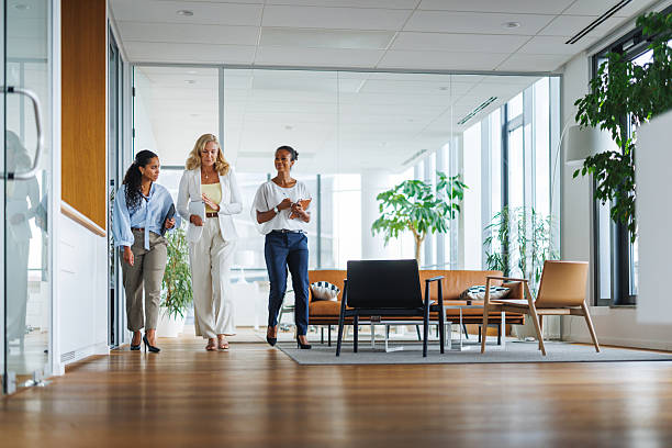 istock Animated Discussion Among Diverse Women in Office Setting 2252538450