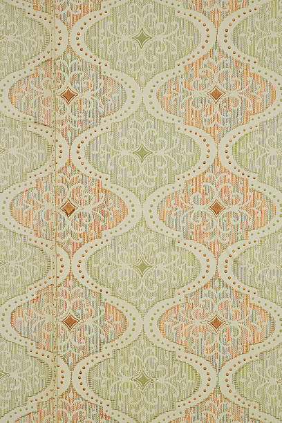 istock Old wallpaper on the wall. Old wallpaper for texture or background. 2252538860