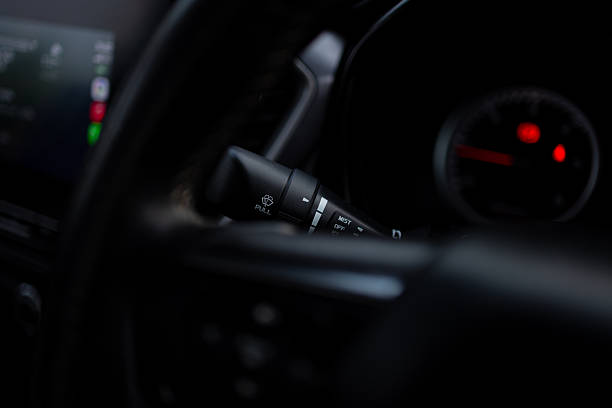 Remote control button for car windshield wipers,Windshield wiper switch in the car,Car windshield wiper switch. Wipers switch control. Adjusting speed wipers in car. Wiper switch toggle. Automotive part concept.