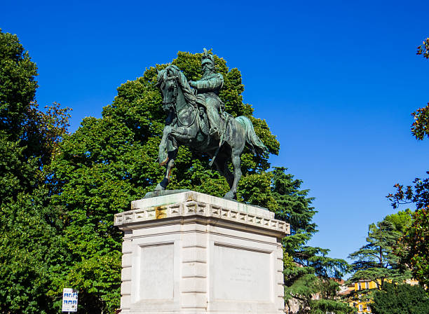 statue of the Italian poet Giosue Carducci (1835-1907) on Piazzetta di Giosuè Carducci in front of the entrance to the Nicola Bernardini Library in the city of Lecce; Lecce, Italy