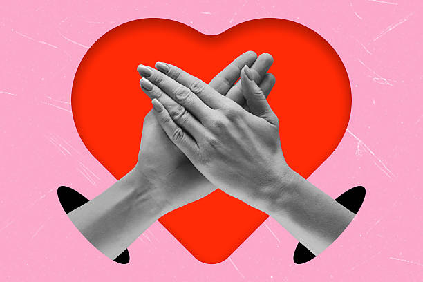 istock Hands coming together to form a heart shape against a bright pink background featuring simple shapes 2252555107