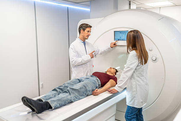 istock Doctors explaining mri scan procedure to patient 2252557257