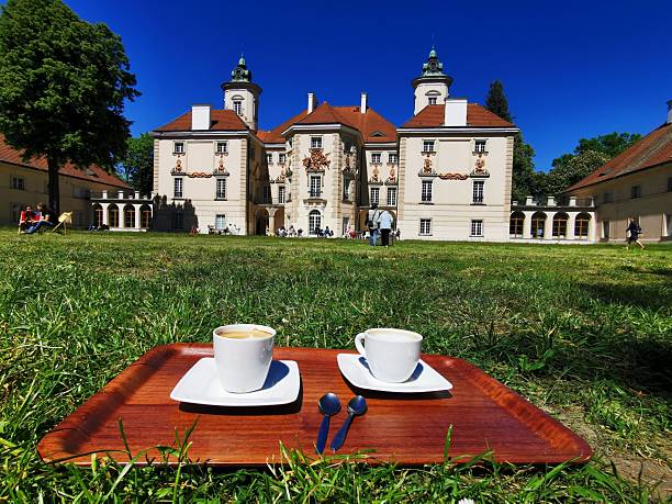 Two cups of coffee in garden of the palace in Otwock Wielki, branch of the National Museum