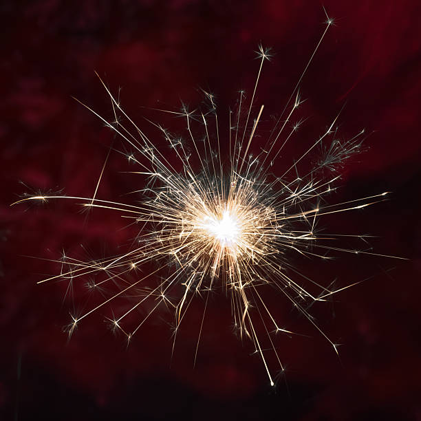 istock Sparkler Radiance on Deep Red 2252558334
