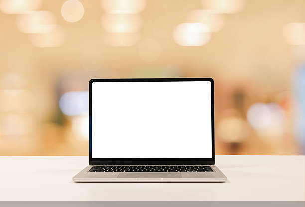 istock close up isolated on blank white screen display of laptop computer on table inside office room for add content of design banner , website or template or online shopping e-commerce concept 2252562172