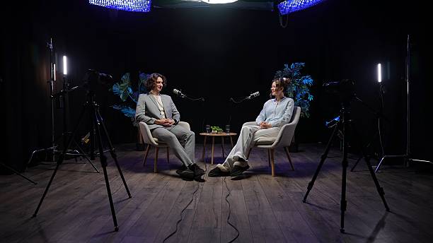 istock Engaging Conversation Unfolds in an Intimate Podcast Studio Setting With Expert Influencers 2252563080