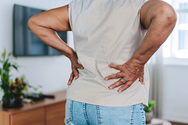 istock Senior Woman Touching Lower Back In Pain 2252563385