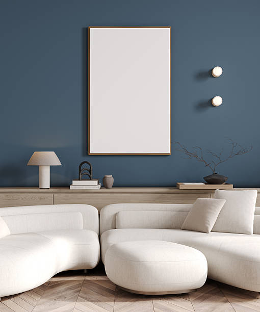 istock Big frame poster mockup in dark blue living room with white sofa, 3d render 2252563489