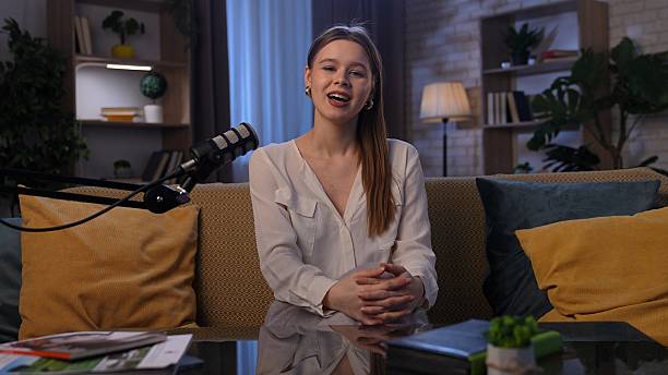istock Engaging Conversation With a Digital Influencer in a Cozy Home Studio Setting 2252564752
