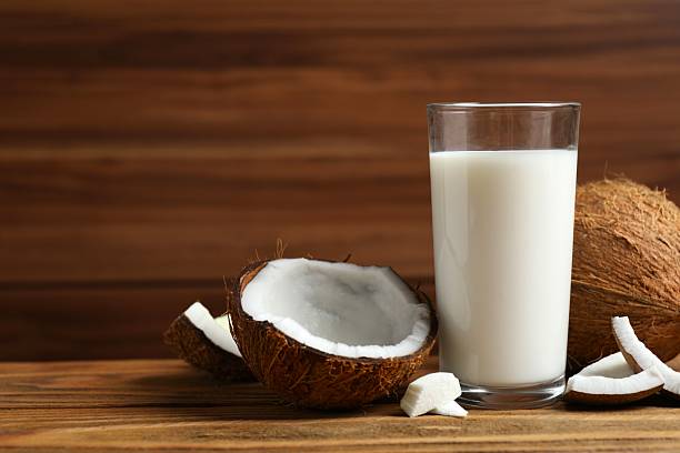 istock Glass of milk with coconuts on the table 2252567024