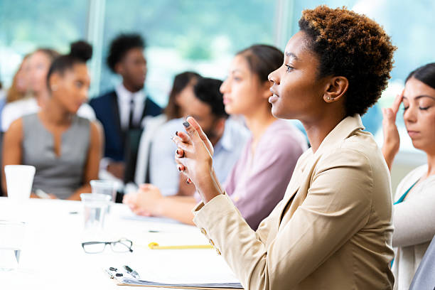 istock Diverse group of professionals engaged in a productive meeting, collaborating and sharing ideas. 2252568276
