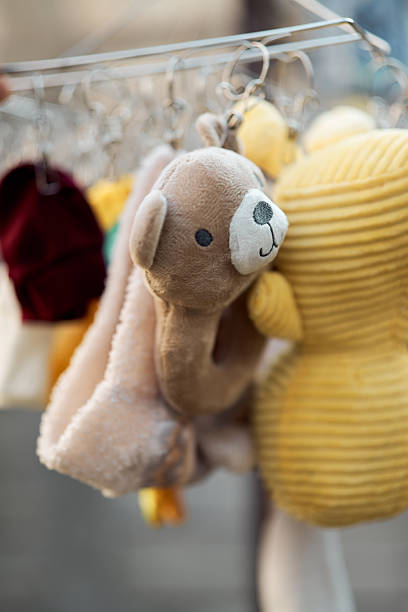 istock Baby clothes hanging with colorful garments 2252570250