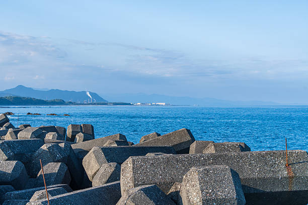 istock Coastal Breakwater Blocks and Blue Sea 2252571437
