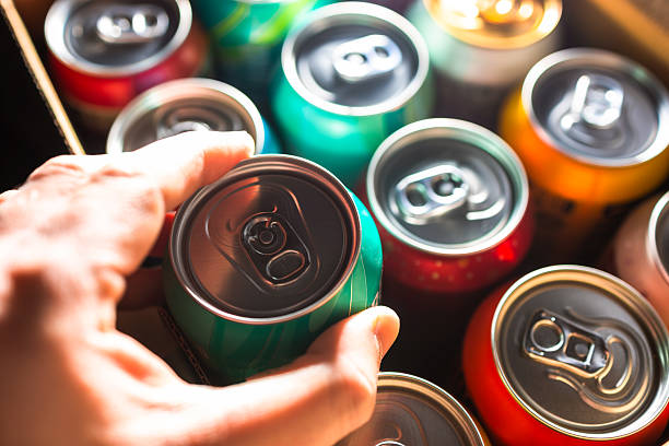 istock Selecting a can of beer from the box 2252574608