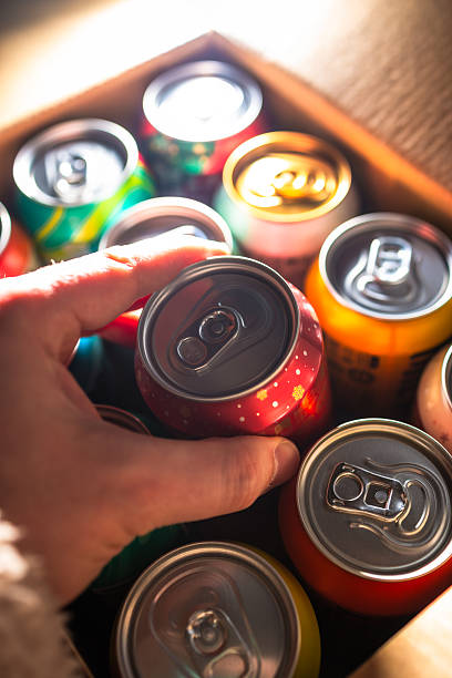 istock Selecting a can of beer from the box 2252574616