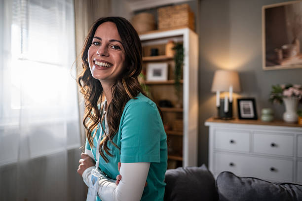 istock Happy female caregiver looking at camera and smiling 2252576192