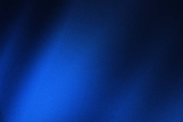 Black dark cobalt blue silk satin. Silky shiny fabric. Beautiful elegant background. Light shadow glow shimmer shine gradient. Curtain drapery. Christmas birthday festive. Blank template design.