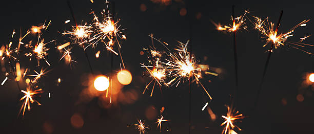 istock Sparklers in the night sky with glowing bokeh 2252581291