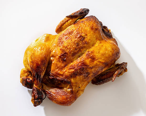 istock Whole roasted golden chicken on white background 2252581496