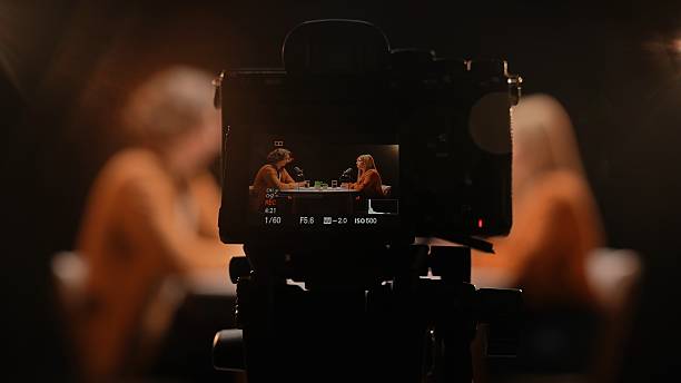 istock Engaging Dialogue Unfolds in Intimate Studio Setting During Vibrant Podcast Recording Session 2252586371