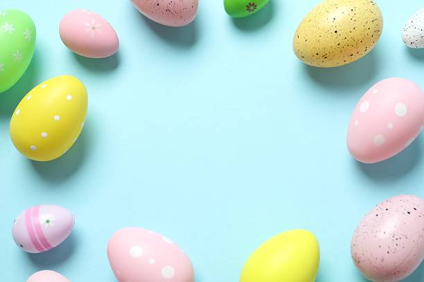 istock Happy Easter. Colorful eggs on color background, space for text or advertising 2252588594
