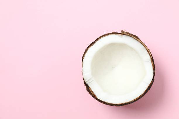 istock Coconut on color background, top view 2252588943