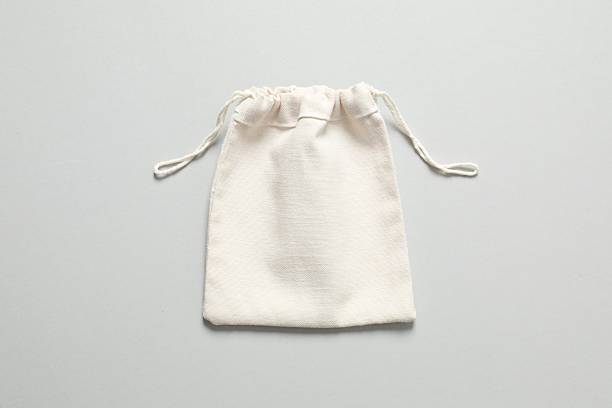 istock Small eco sack on grey background. Top view. 2252594170