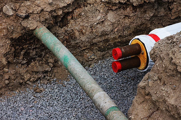 istock Building pipes under the ground 2252596420