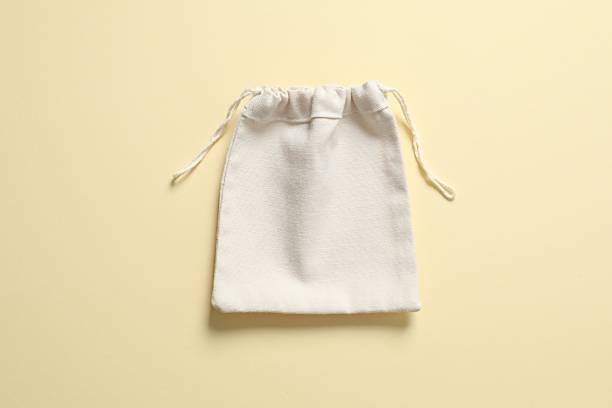 istock Small eco sack on color background. Top view. 2252597396