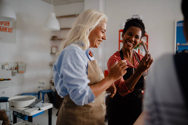 istock Multicultural Women Creating Pottery Together in Ceramics Workshop 2252601546
