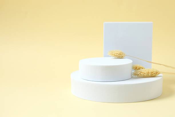istock White podiums on color background 2252602094