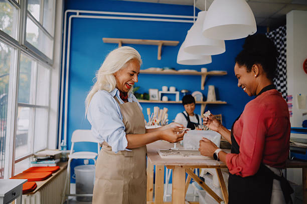 istock Multicultural Women Creating Pottery Together in Ceramics Workshop 2252602153