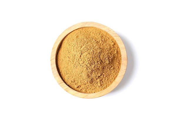 istock Fragrant ground cinnamon. Cinnamon powder on a wooden background 2252603541