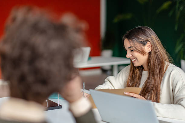 istock Team members work together in a modern office setting focusing on tasks and collaboration during the working day 2252603650