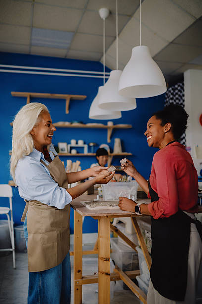 istock Multicultural Women Creating Pottery Together in Ceramics Workshop 2252603904